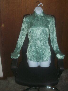 womens Moda International/Vict. Secret shiny blouse.Size small